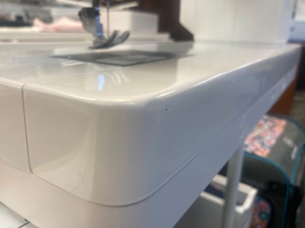 Housing of a Janome Continental M8 AFTER the Power-Coating process is complete.