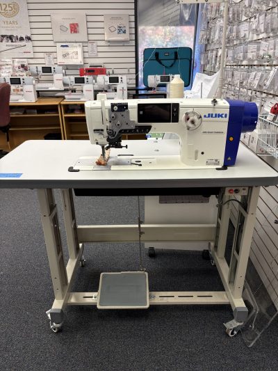 Pre-owned Juki LU-2828V-7 industrial walking foot sewing machine full product shot